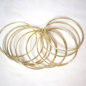 Set of 9 Gold Tone Skinny Bangles Stackable Fashion Bracelets